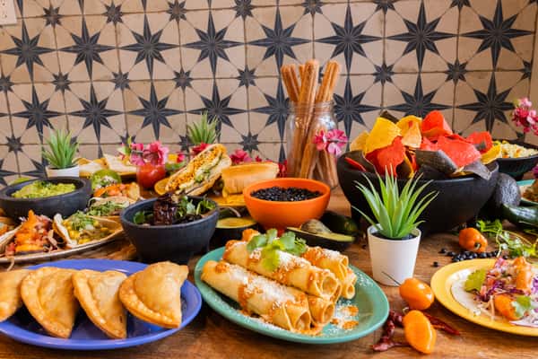 A spread of Mexican food on a table