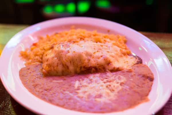 One Chicken, Ground Beef or Cheese Enchilada, One Taco, and your choice of Rice or Beans