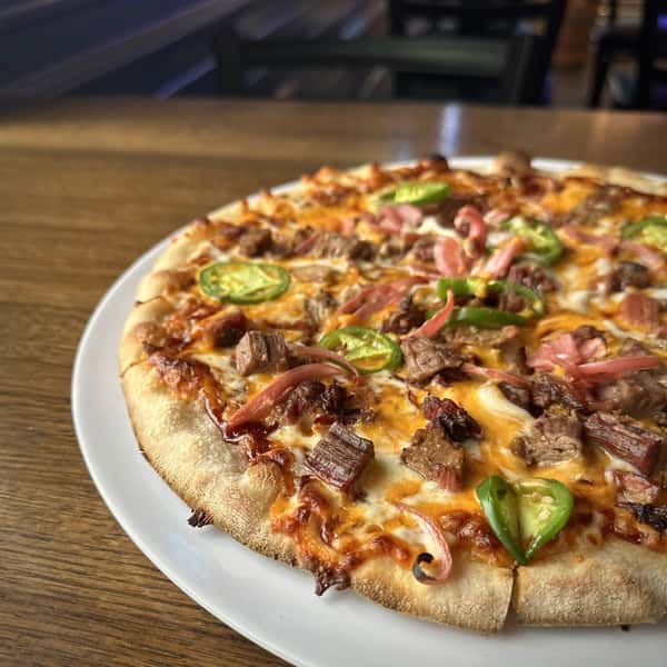 Hand-stretched dough, beef brisket, cheddar, mozzarella, jalapenos, pickled onion, barbecue sauce