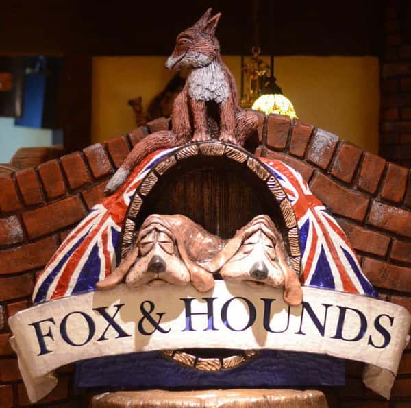 fox & hound logo statue