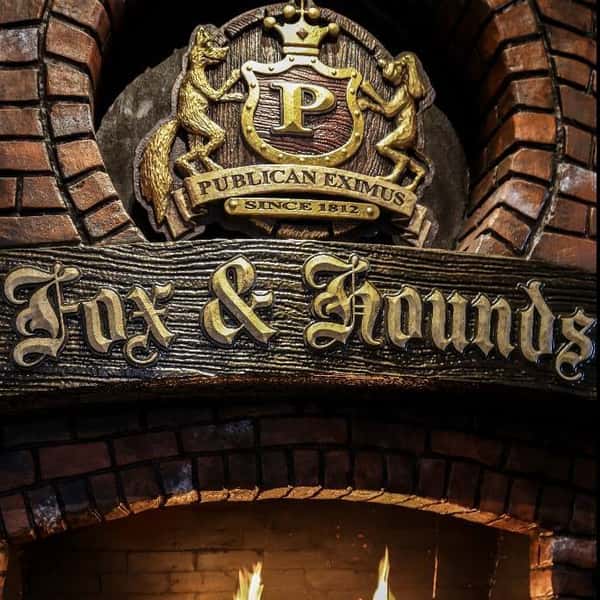 fox & hound logo statue