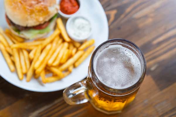 Burger with fries and beer