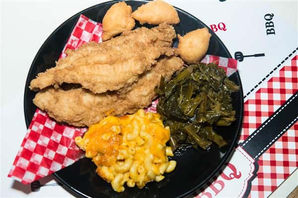 fried fish with vegetables and hush puppies