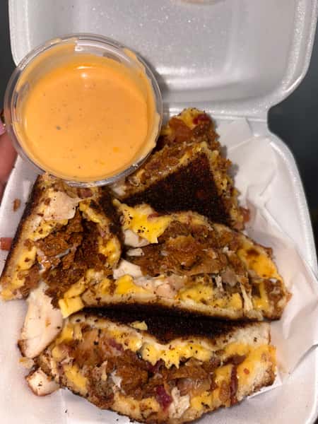 Sandwich meal with saucy side