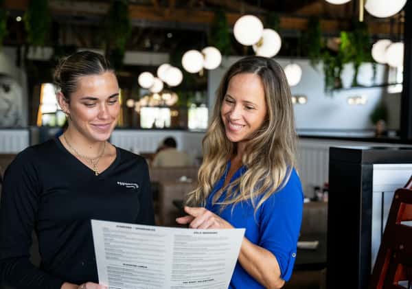 Franchisee and staff memember