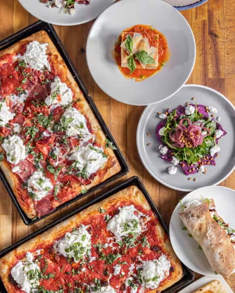 Pizza. Salads. Pasta. And more — all made from scratch and ready to share. ✨ Pull up a chair and make a proper night of it at Teglia. Your table is waiting.