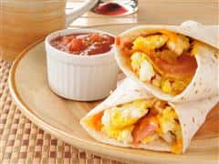 Eggs, Ham, & Cheese in a wrap with side salsa.