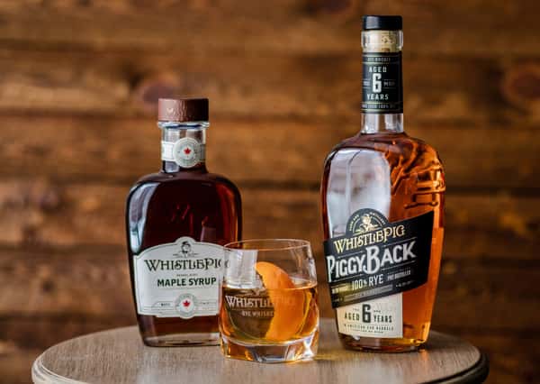Elegant whiskey bottles displayed together, inviting guests to enjoy premium selections at a whiskey bar in Texas.
