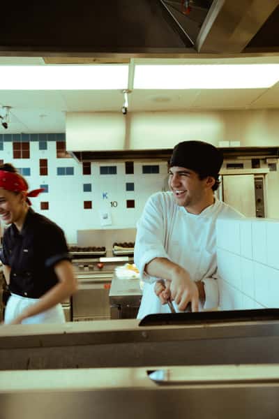 Culinary team working in kitchen