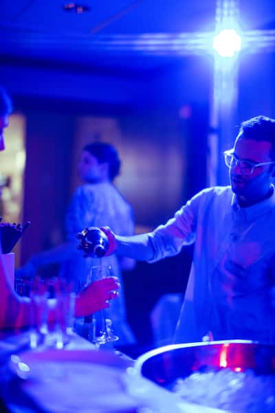 Bartender serving drink