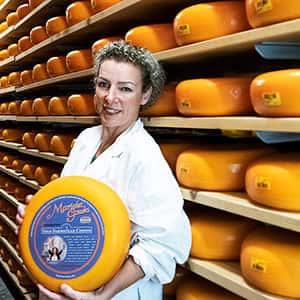 marieke holding cheese wheel