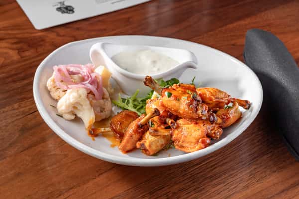 Sweet & Spicy Frenched One Bite Chicken Wings