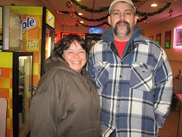 A man and a women posing for a picture