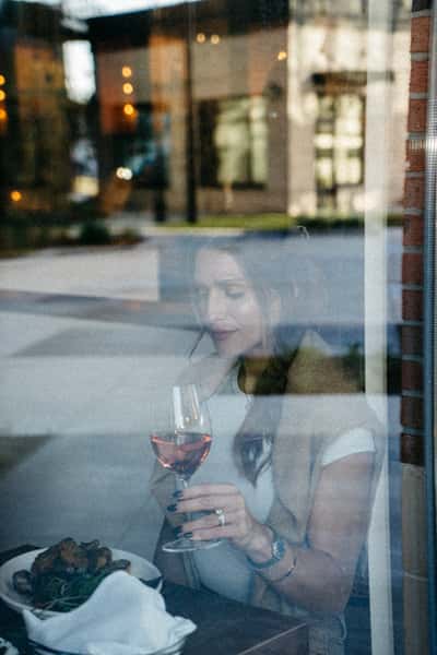 Guest enjoying a glass of wine
