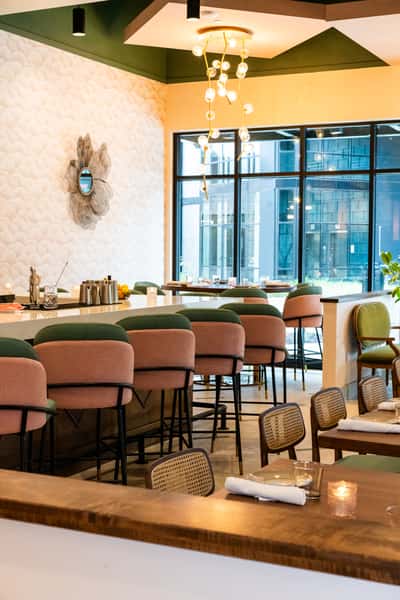 Marble bar with pink plush seating