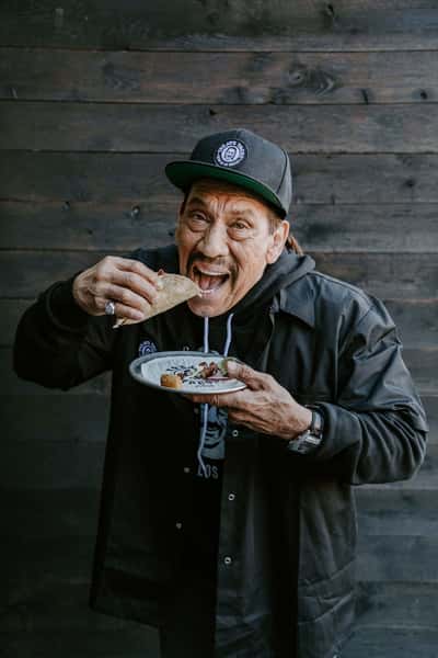 Danny eating a Trejo Taco