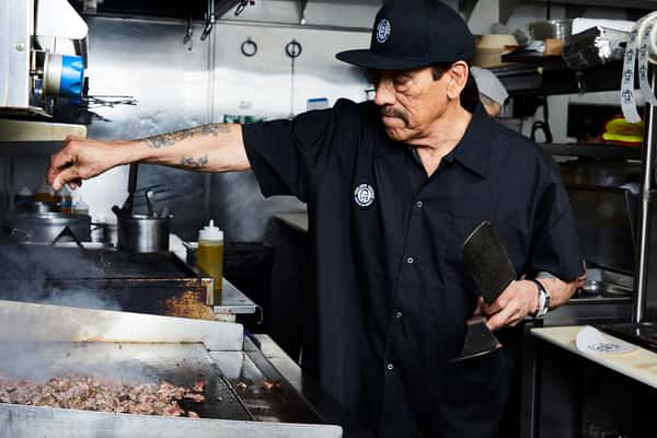 Danny Trejo prepping a food order