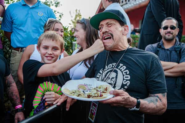 Danny Trejo being punched by a fan