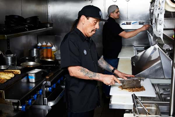 Danny prepping a food order at Trejos Tacos