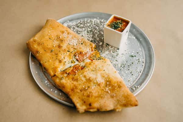 STEAK OR CHICKEN STROMBOLI