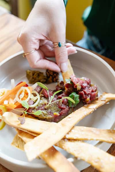 Picture of a white plate with food on top