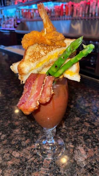 bloody mary with bacon and grilled cheese topper