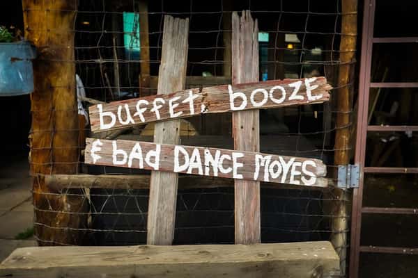 buffet-booze-dance-moves sign