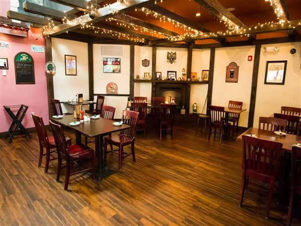 tables and chairs inside restaurant