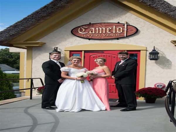 bride and groom with best man and bridesmaid