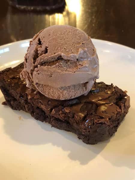 brownie with a scoop of chocolate ice cream