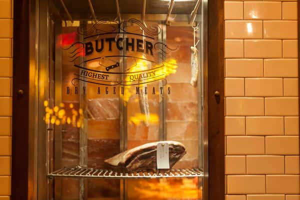 window with butcher sign