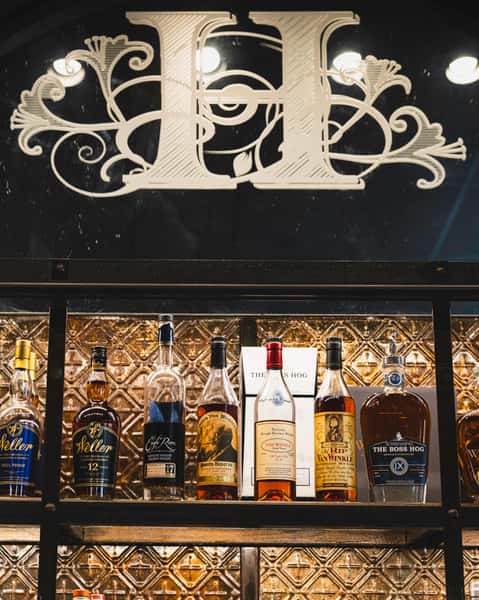 shelf with bottles of spirits