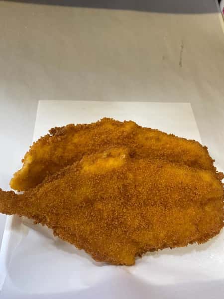 Golden breaded fish fillet freshly prepared at Blue Bay in Bridgeton.