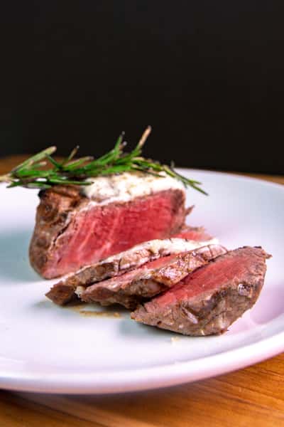 rare filet mignon with herbs