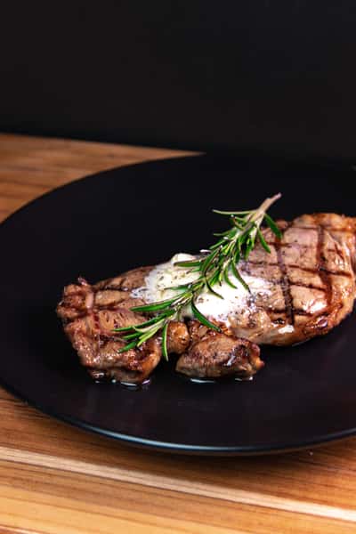 new york strip with butter and herbs