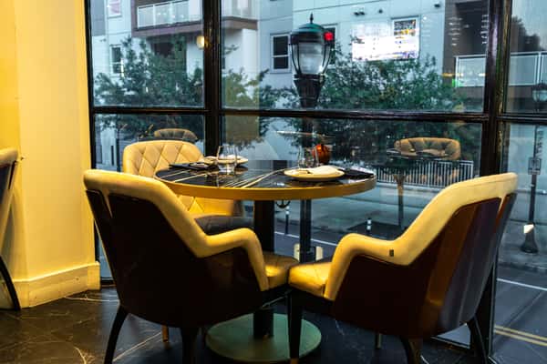 Dining room table with yellow chairs