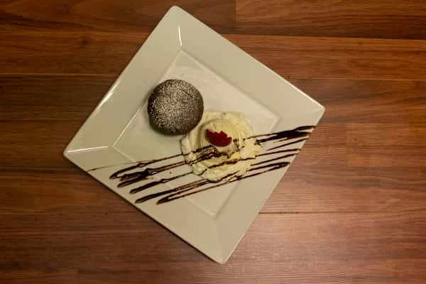 Chocolate souffle with a side of ice cream