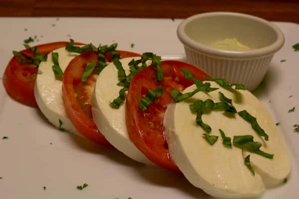 Caprese salad with basil
