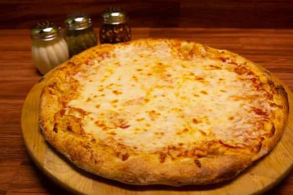 Cheese pizza pie on a wood board
