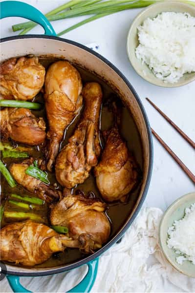 Drumsticks and rice over gravy