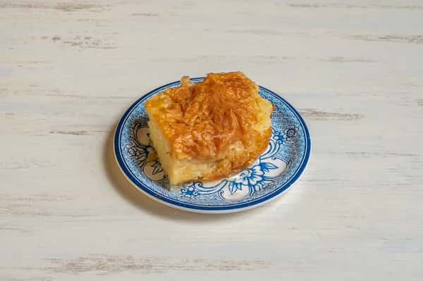 Our housemade custard pie, wrapped in filo and topped with syrup and cinnamon