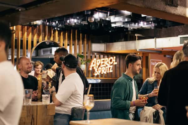 venue shot of people enjoying drinks
