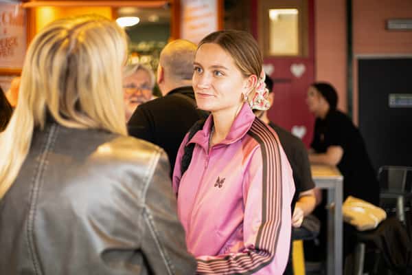 girl smiling at friend