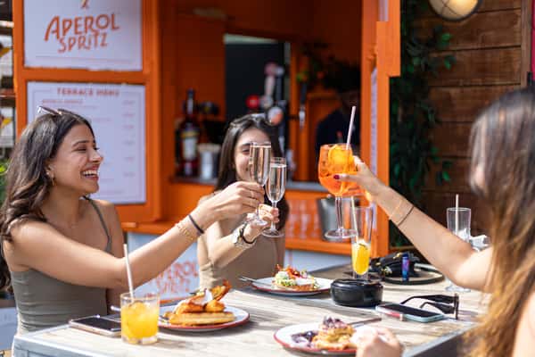 cheersing at brunch