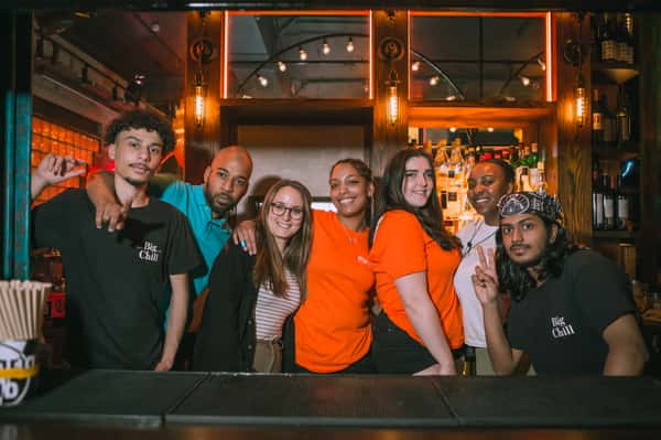 photo of big chill crew behind bar
