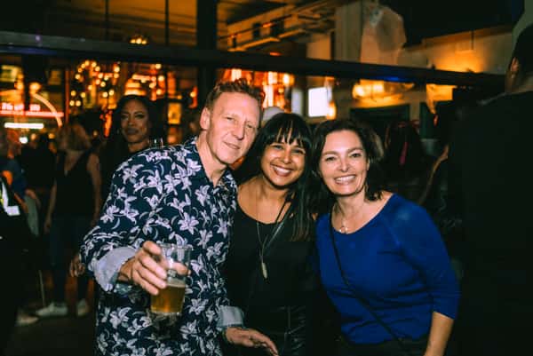 3 people smiling
