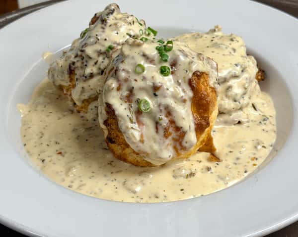 Chicken fried steak topped with creamy country gravy and fresh chives