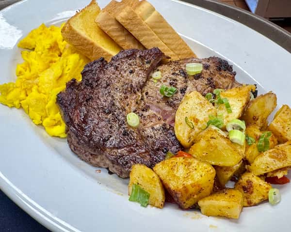Ribeye Steak and Three Eggs