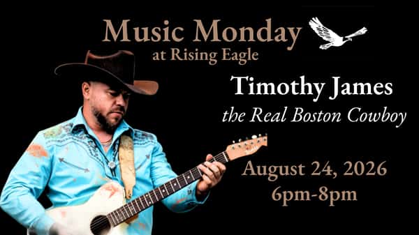 Timothy James, the real Boston cowboy, playing guitar