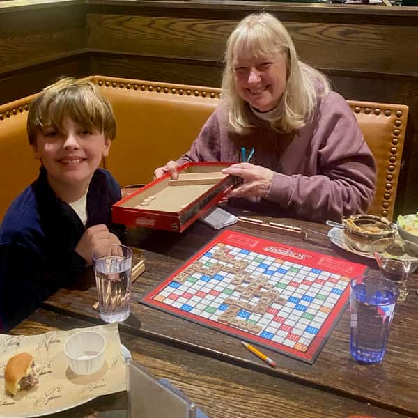 mom and son playing Scrabble